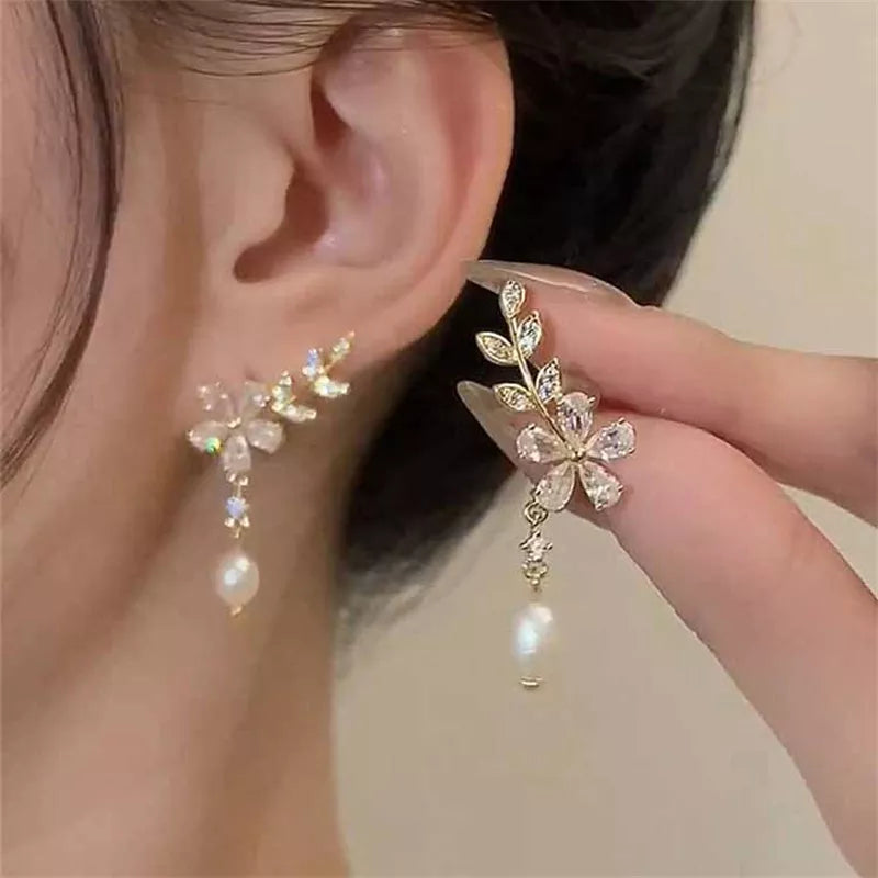 Earrings with flower zircon crystals featuring a tassel 